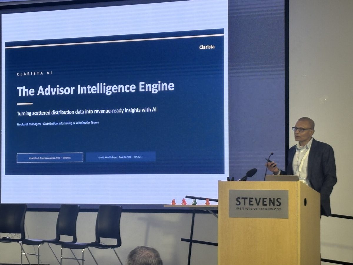 Suvrat Bansal presenting the Clarista Advisor Intelligence Engine on stage